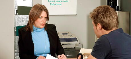 Very attractive older Randi Layne posing in sexy lingery on camera